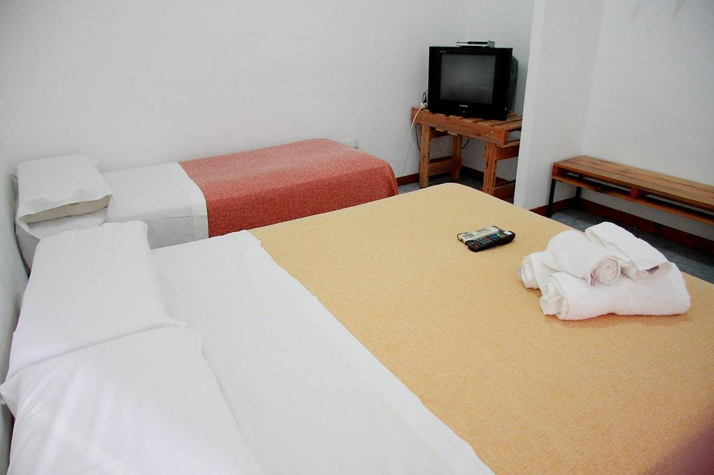 Los Brunos Apart Reconquista Habitación foto