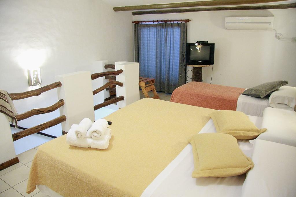 Los Brunos Apart Reconquista Habitación foto
