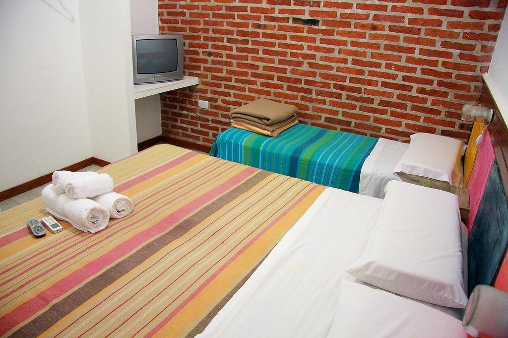 Los Brunos Apart Reconquista Habitación foto